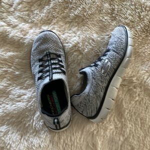 Size 7.5 Skechers air-cooled memory foam slip on sneakers